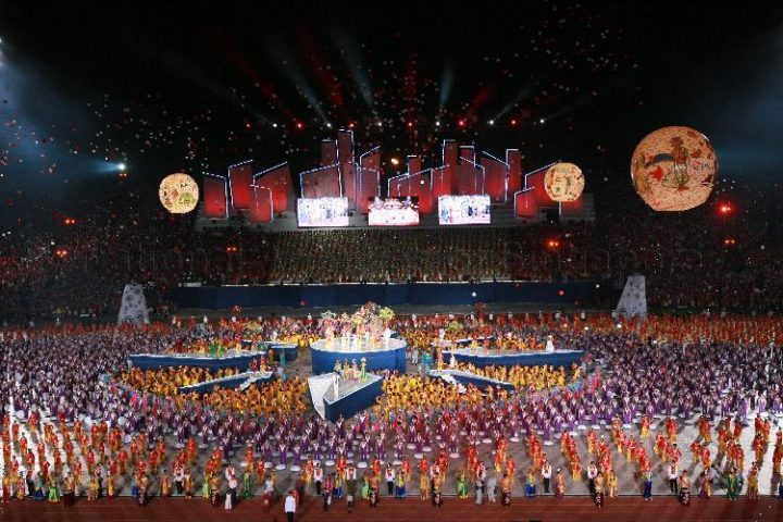 Performers gathering at the 2006 NDP at National Stadium. Source. 