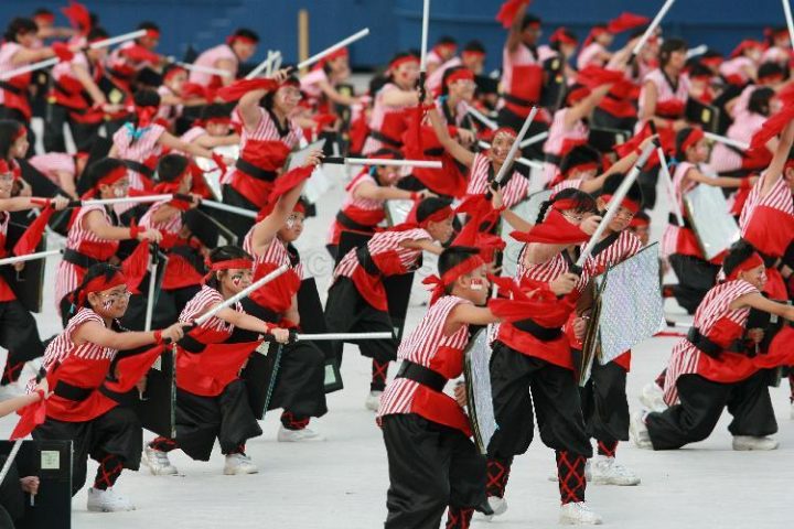 Students performing at the 2006 NDP. Source. 