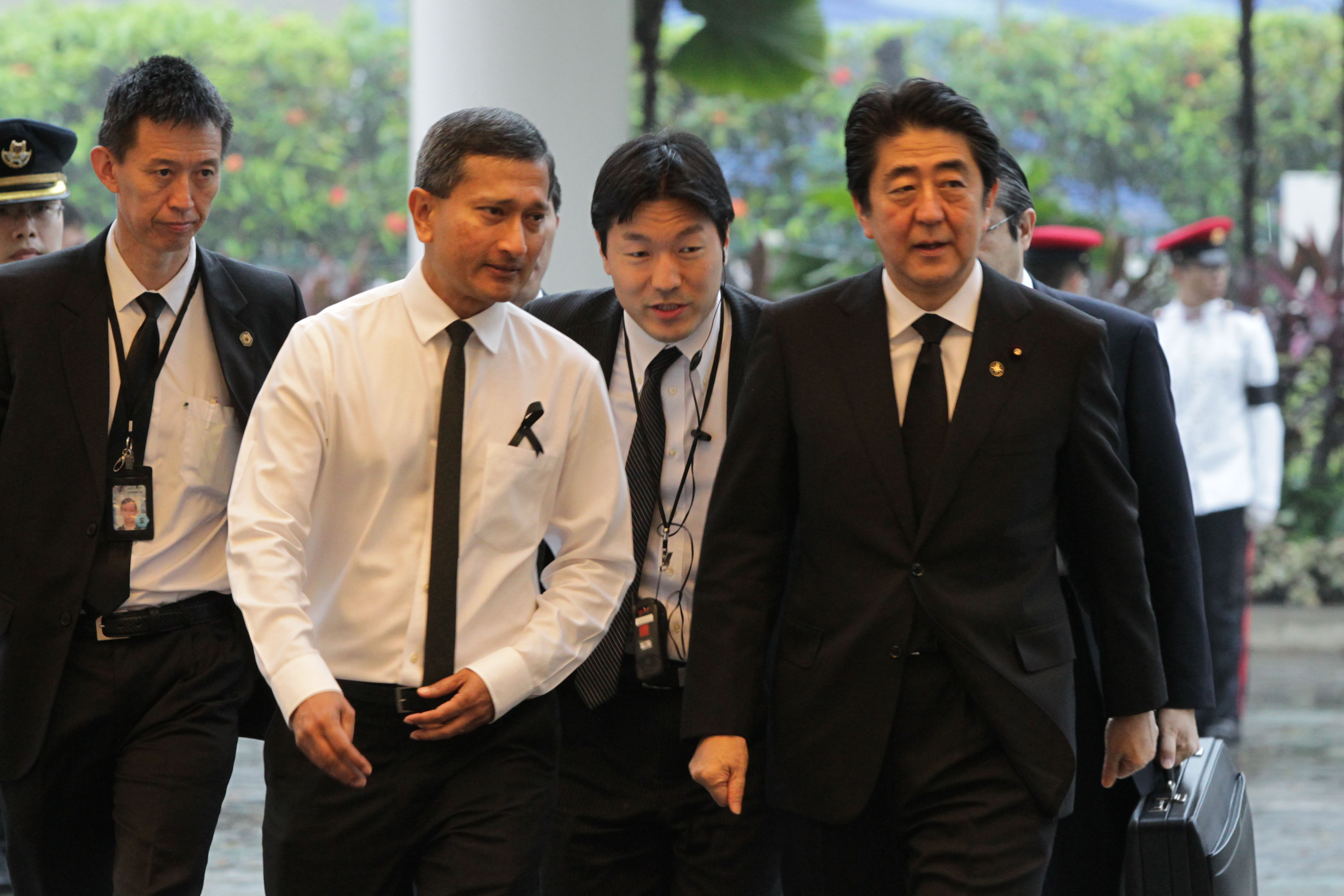 SINGAPORE, MARCH 29: In this handout image provided by the Ministry of Communications and Information (MCI) of Singapore, Prime Minister Shinzo Abe attends the funeral of the late Mr Lee Kuan Yew at the University Cultural Centre, National University of Singapore on March 29, 2015 in Singapore. Mr Lee Kuan Yew passed away on the morning of March 23, 2015 at Singapore General Hospital at the age of 91. Lee Kuan Yew was a Singaporean politician and the first Prime Minister of the country, governing for over 30 years and famed for his achievements in bringing a third world country to first world status in a single generation. (Photo by Ministry of Communications and Information of Singapore via Getty Images)