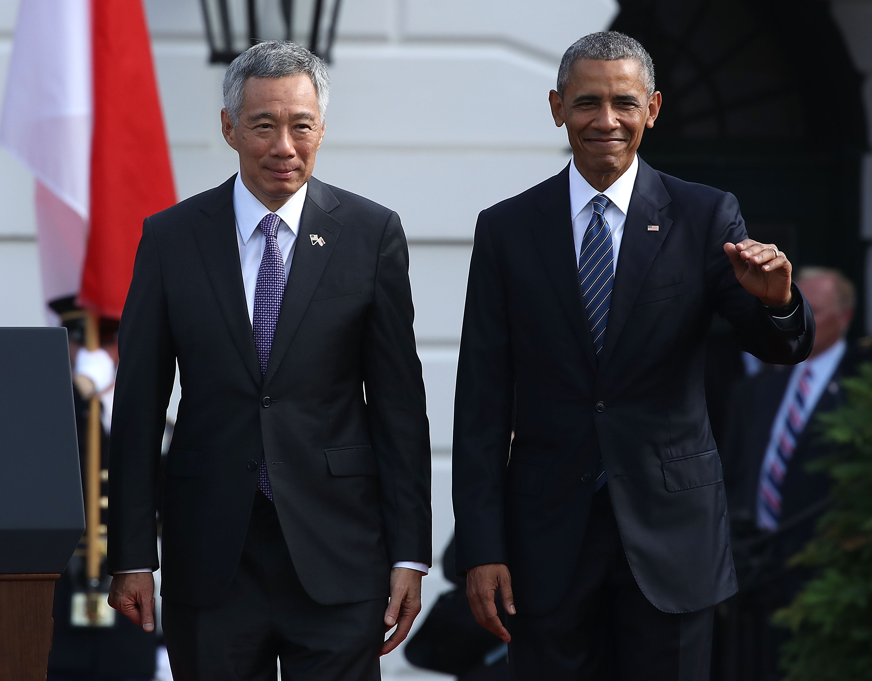 WASHINGTON, DC - AUGUST 02: U.S. President Barack Obama (R) welcomes Singapore Prime Minister Lee Hsien Loong during an arrival ceremony on the South Lawn of the White House August 2, 2016 in Washington, DC. The president and first lady Michelle Obama will host a state dinner in Loong's honor, just the 11th state dinner thrown since Obama became president. (Photo by Mark Wilson/Getty Images)