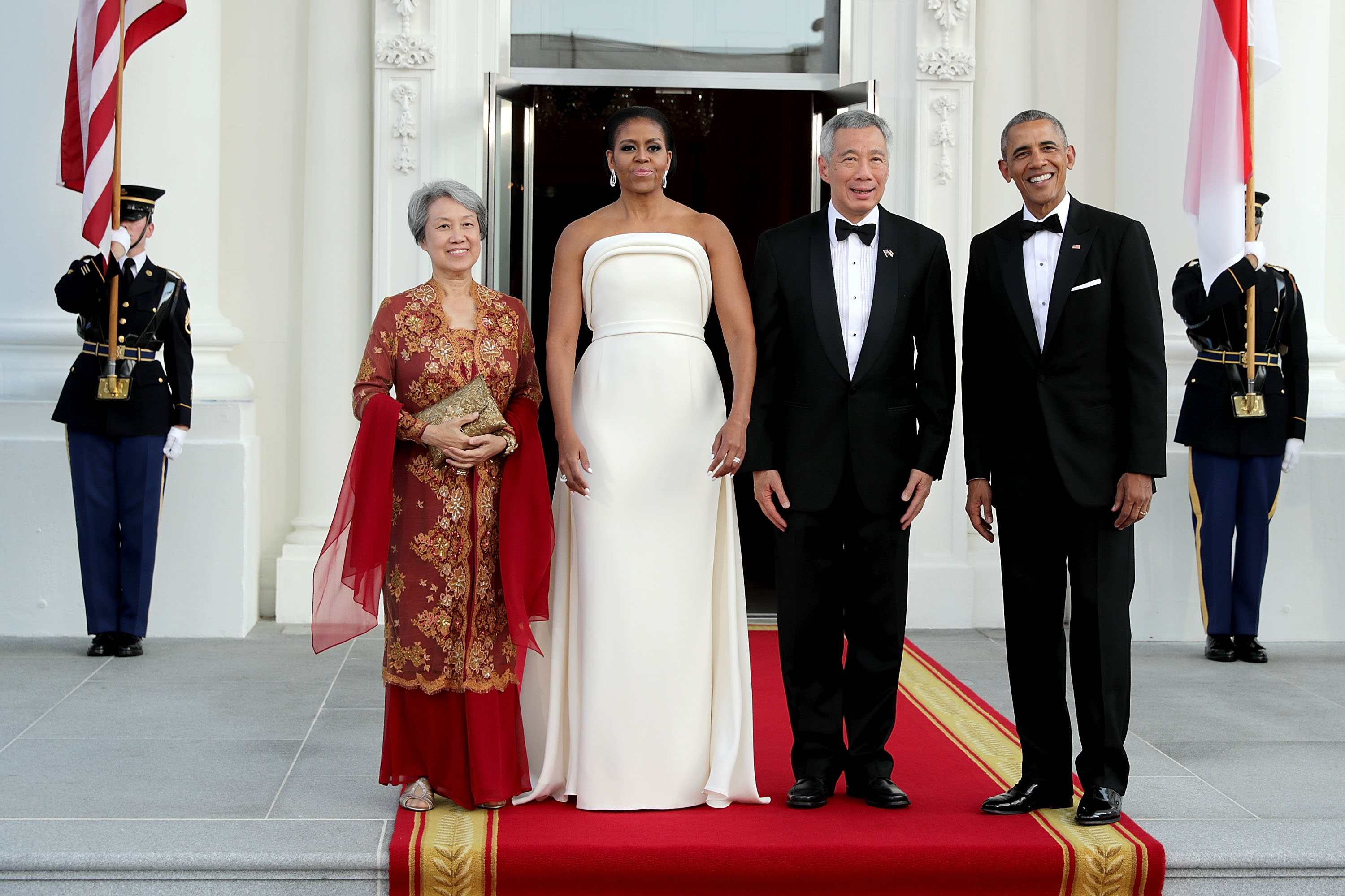 WASHINGTON, DC - AUGUST 02:  (L-R) Ho Ching, first lady Michelle Obama, Prime Minister Lee Hsien Loong of Singapore and U.S. President Barack Obama pose for photographs in the North Portico of the White House August 2, 2016 in Washington, DC. The Obamas are hosting the prime minister and his wife for an official state dinner.  (Photo by Chip Somodevilla/Getty Images)