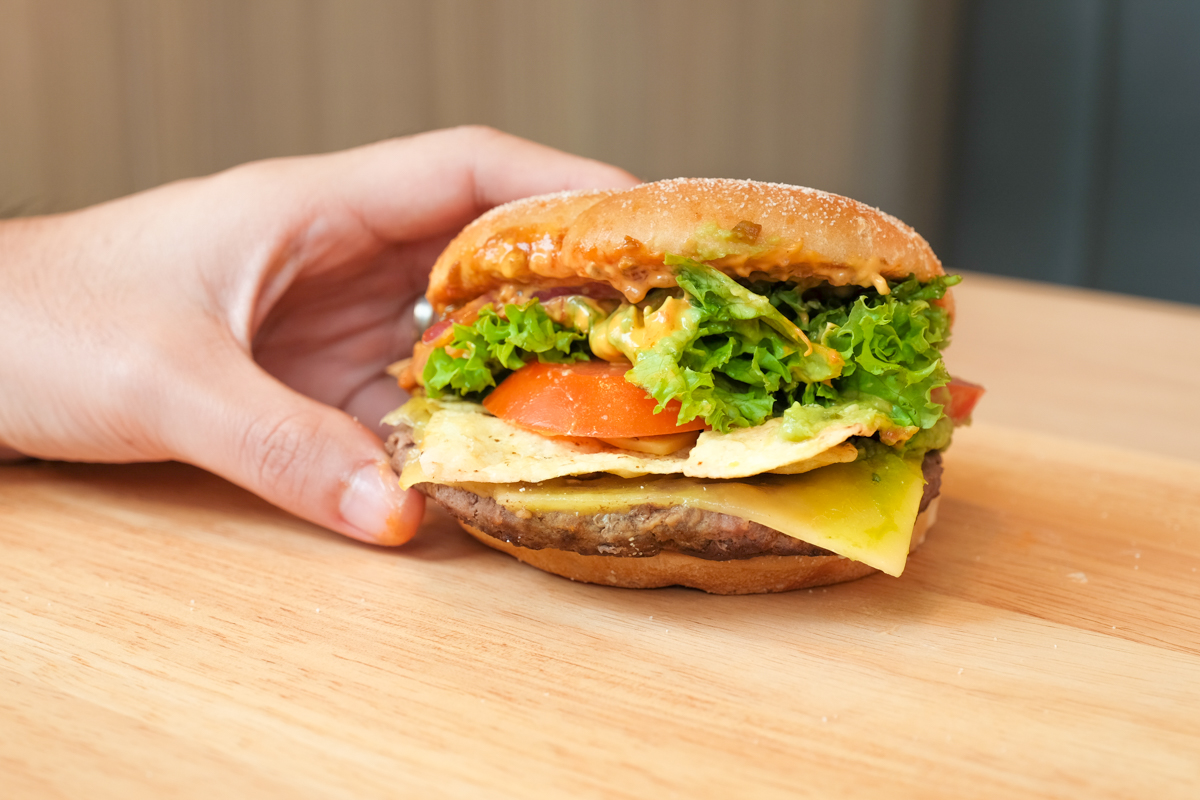 mcdonalds premium signature series spicy tortilla burger hold side