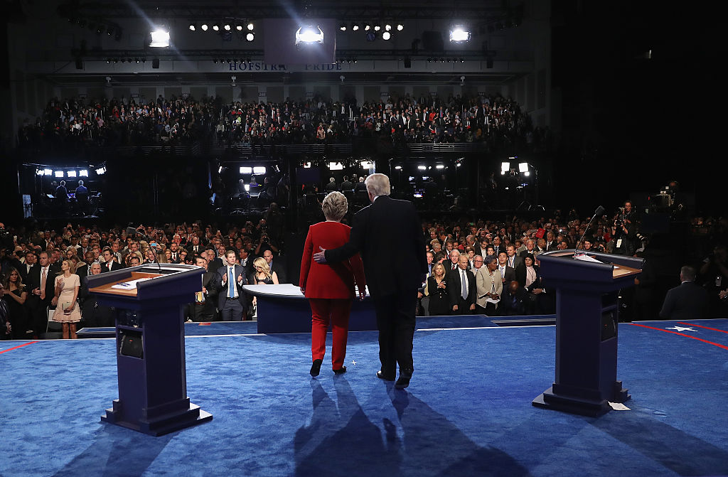 HEMPSTEAD, NY - SEPTEMBER 26: Republican presidential nominee Donald Trump (R) and Democratic presidential nominee Hillary Clinton (L) shake hands after the Presidential Debate at Hofstra University on September 26, 2016 in Hempstead, New York. The first of four debates for the 2016 Election, three Presidential and one Vice Presidential, is moderated by NBC's Lester Holt. (Photo by Joe Raedle/Getty Images)