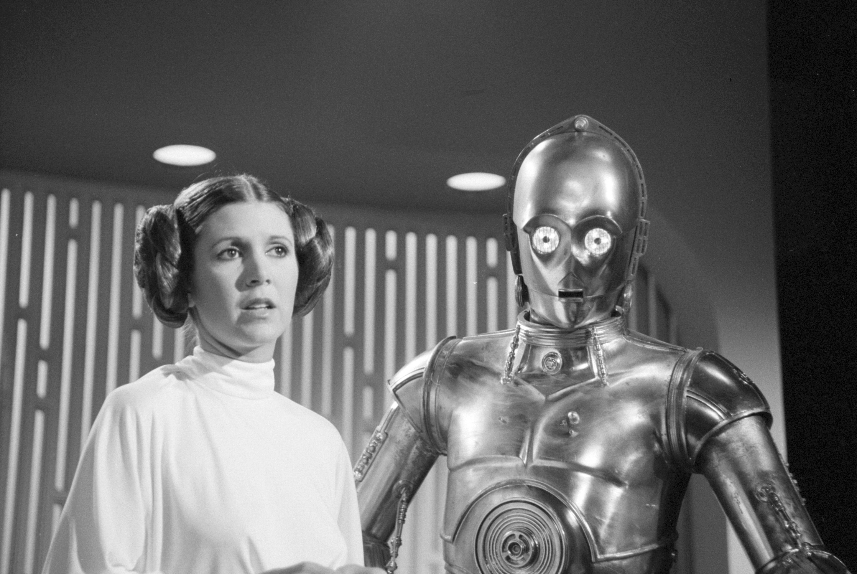 Carrie Fisher (as Princes Leia) and Anthony Daniels (as C3PO) .  Image dated August 23, 1978. (Photo by CBS via Getty Images)