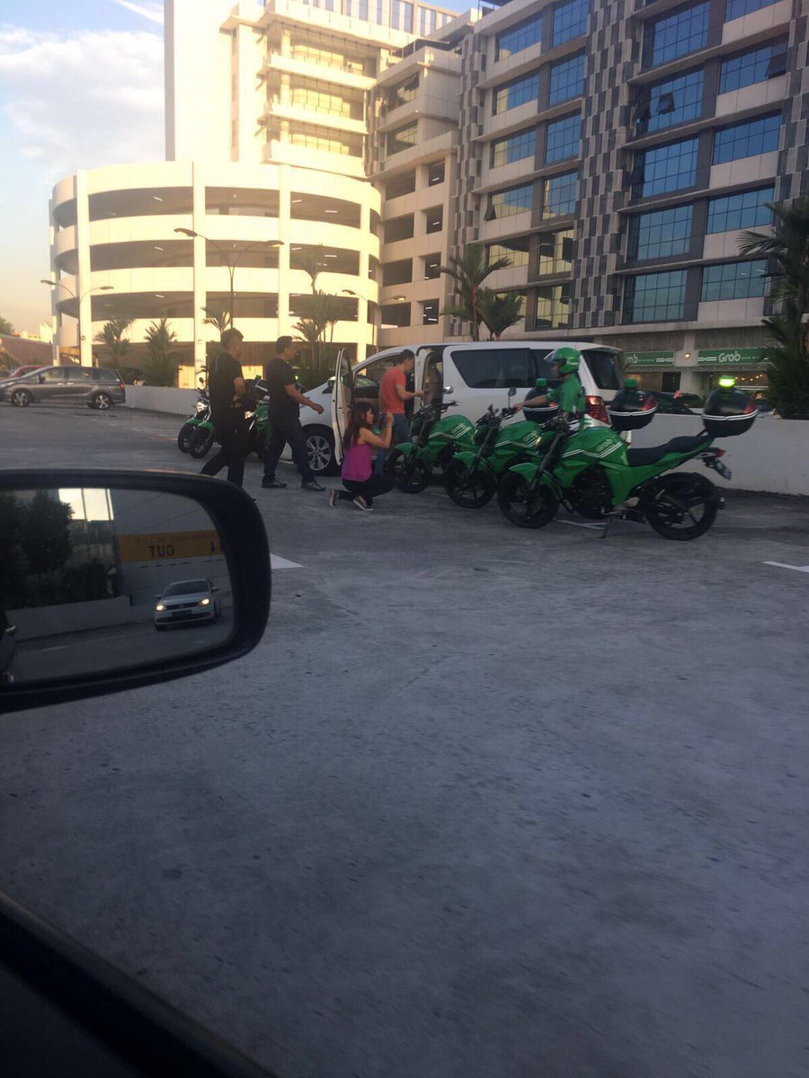 GrabBike spotted in S'pore outside Grab office in Sin Ming Lane