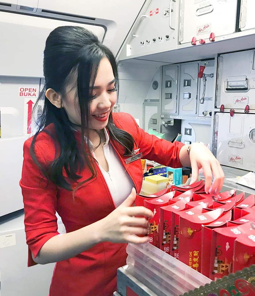 This AirAsia Stewardess Found (More) Fame After Candid 