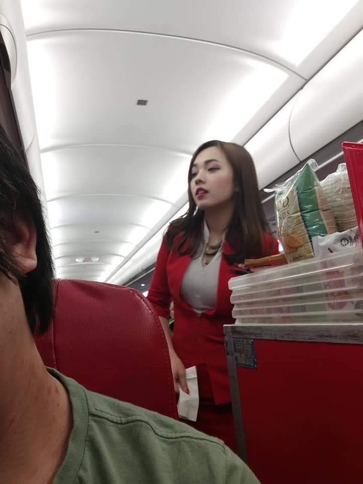 Airasia Flight Stewardess Gains Overnight Fame After Candid Photos Go Viral Mothership Sg News From Singapore Asia And Around The World