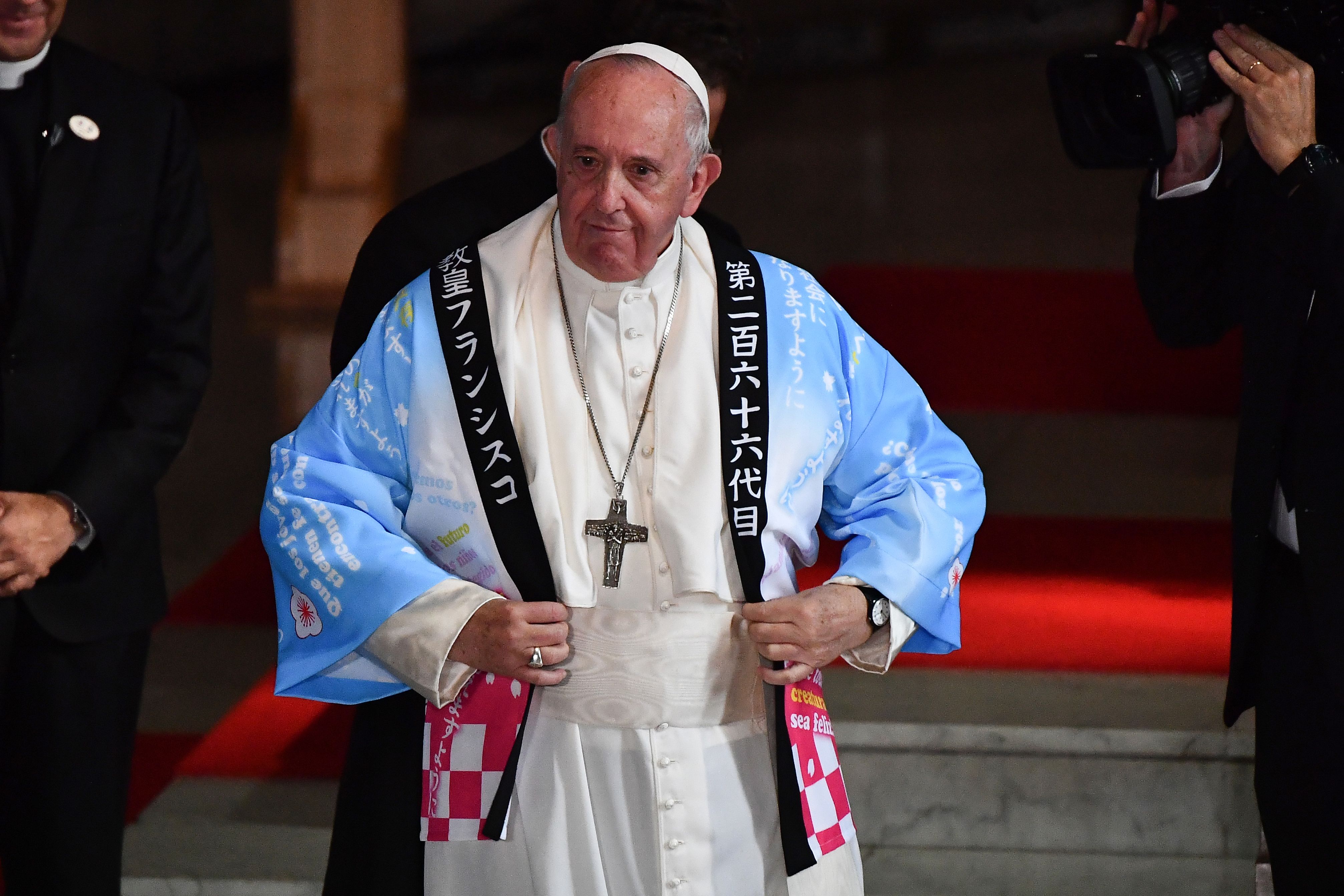 Pope dons traditional coat with anime image of his face to greet the ...