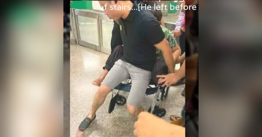 Kind stranger carries wheelchairbound woman up 2 flights of stairs at