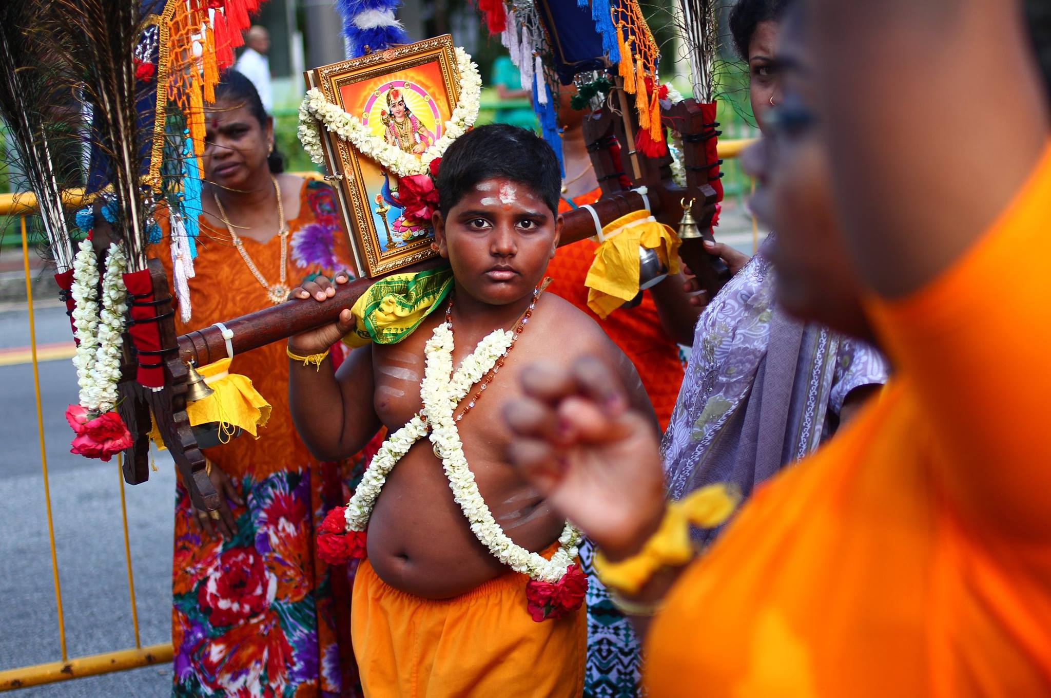 young kid carrying a kavadi in singapore