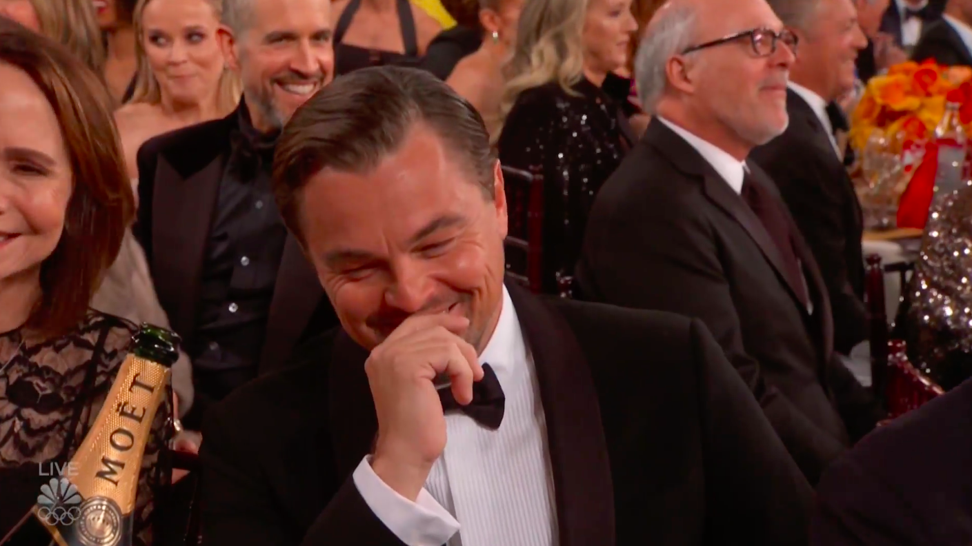 DICAPRIO laugh.