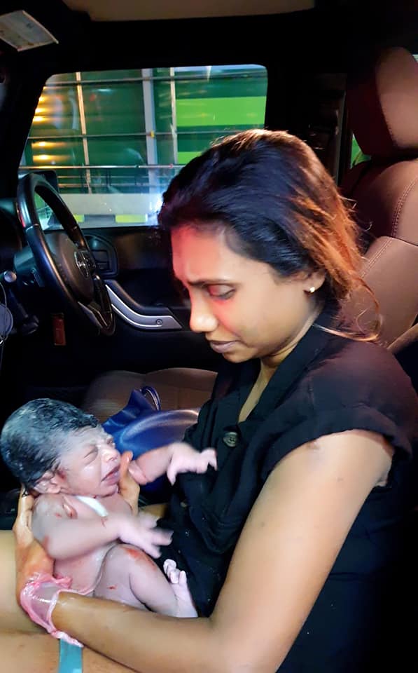 S'pore lady gives birth to son in car, birth cert shows he was born
