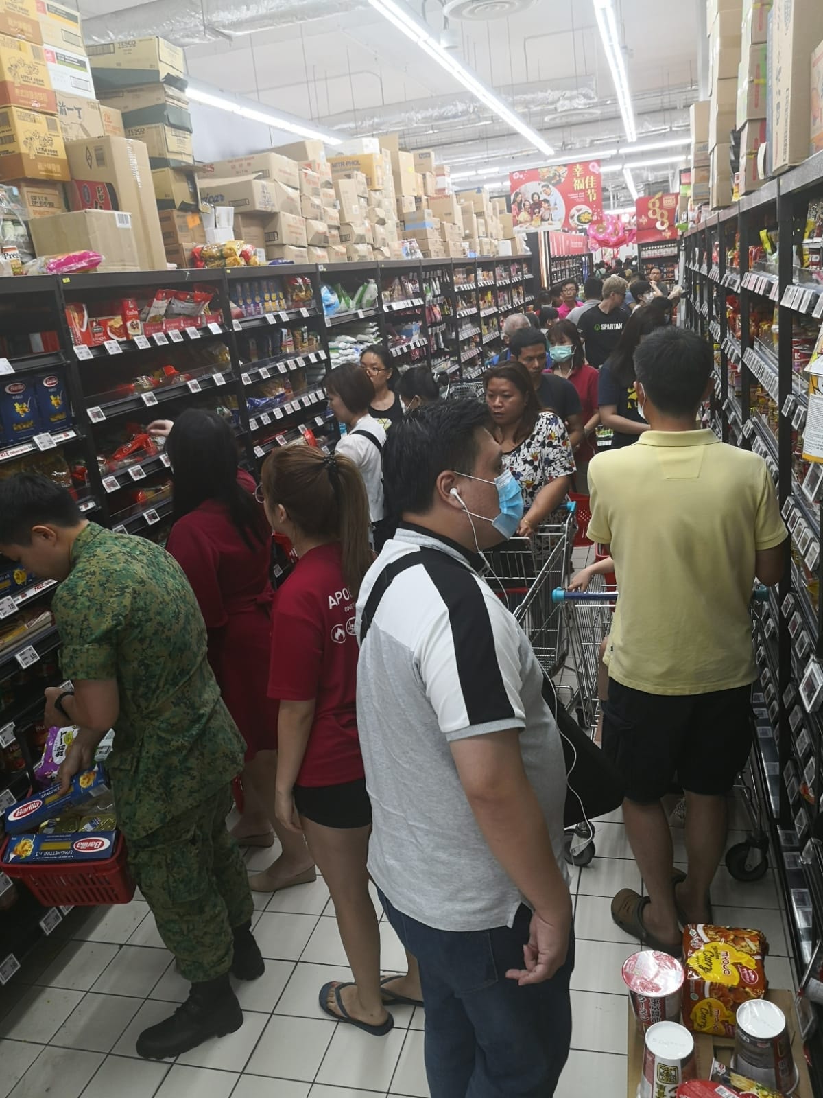 People all over S'pore clearing out supermarket shelves of food