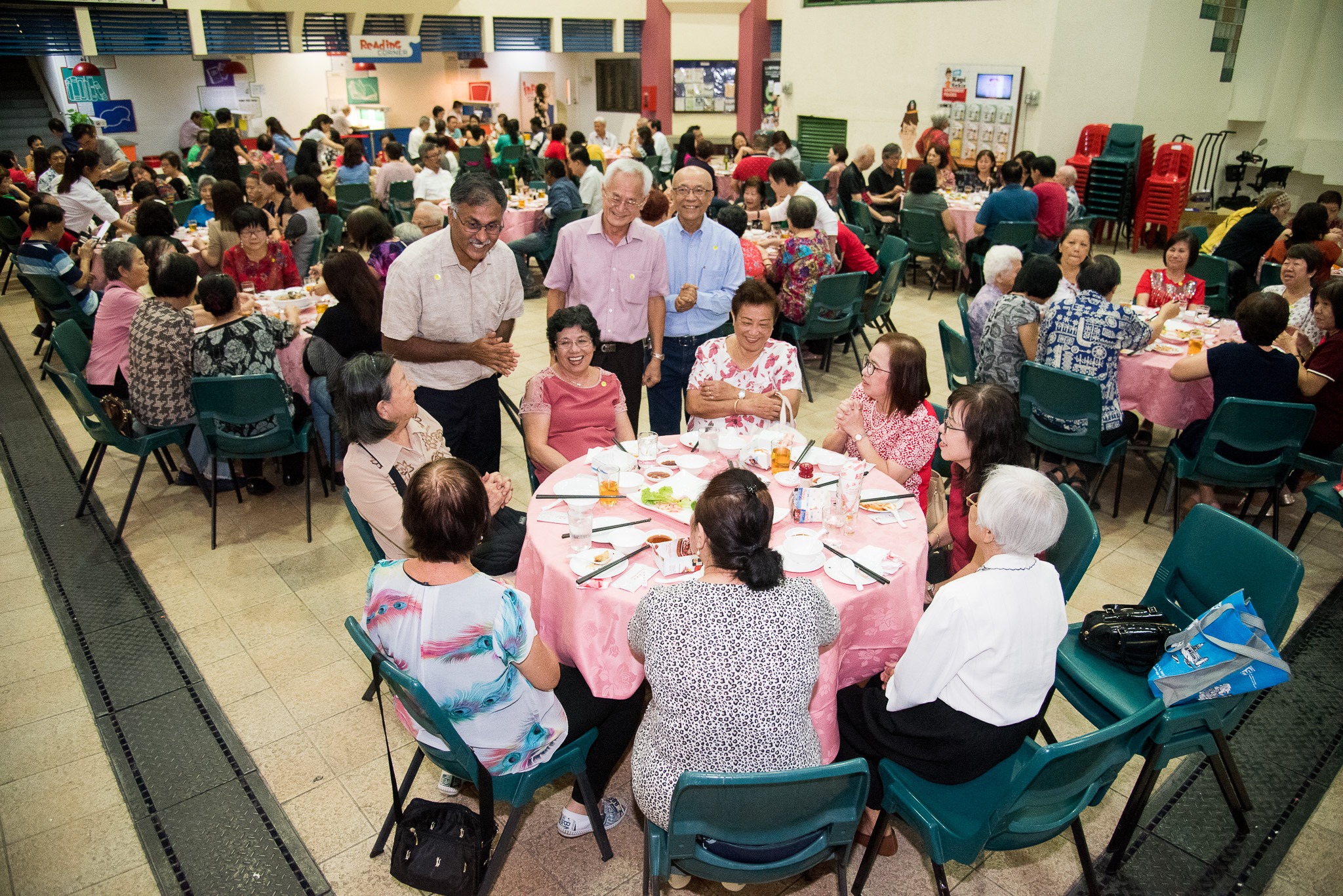 MP Murali Pillai greeting senior citizens at a dinner organised by Bukit Batok CC's Active Ageing Committee
