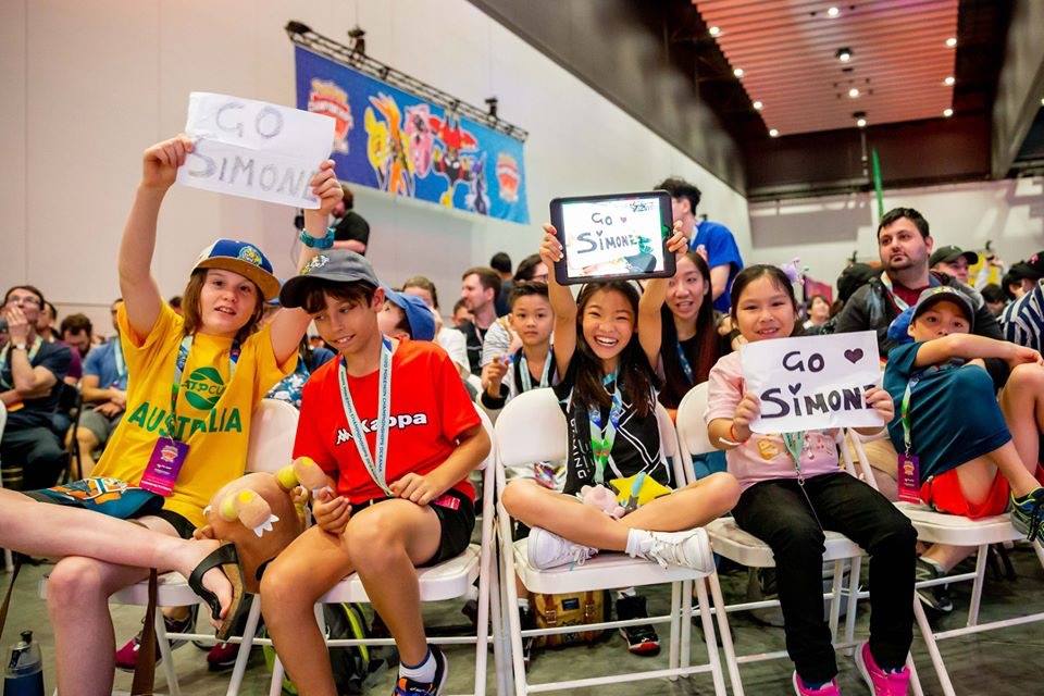 Simone Lim's friends cheering for her at the Oceania International Championship Finals