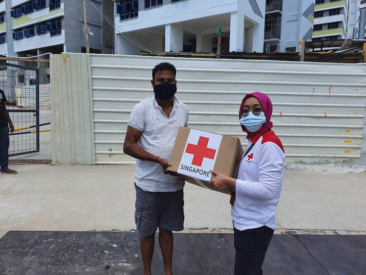 photo of Red Cross donating masks and sanitisers 2