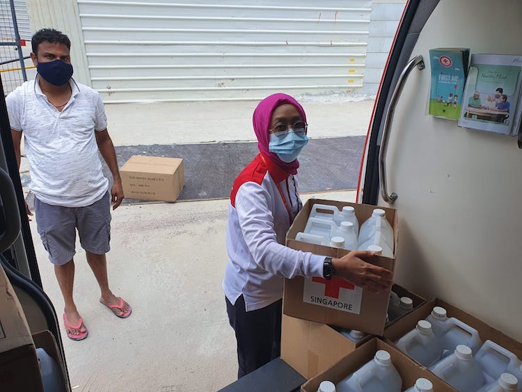 photo of Red Cross donating masks and sanitisers 3