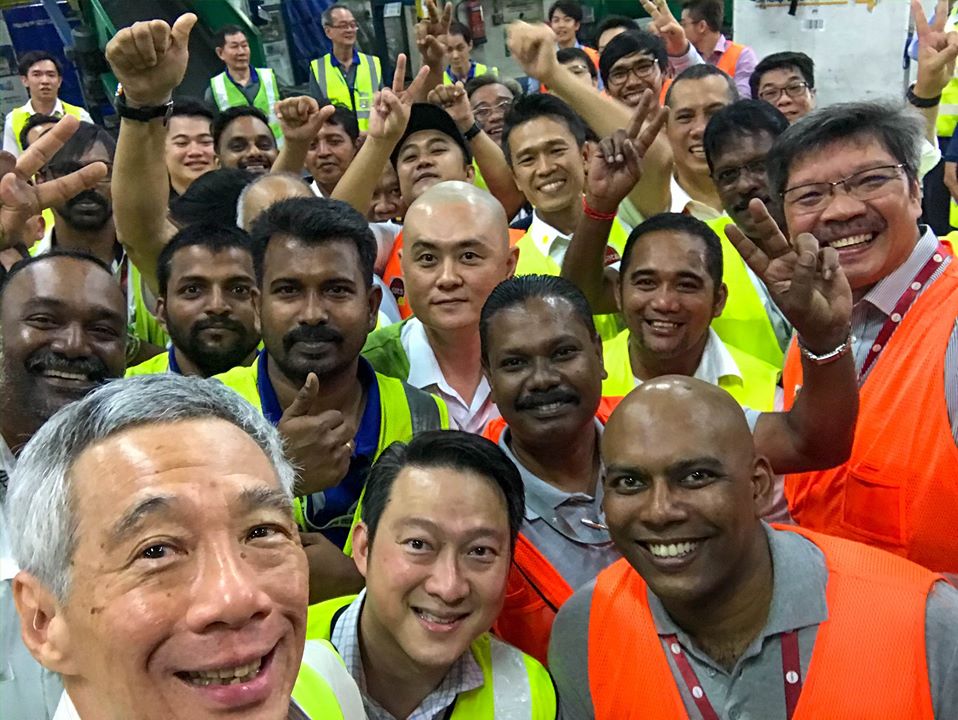 PM Lee with SATS handlers