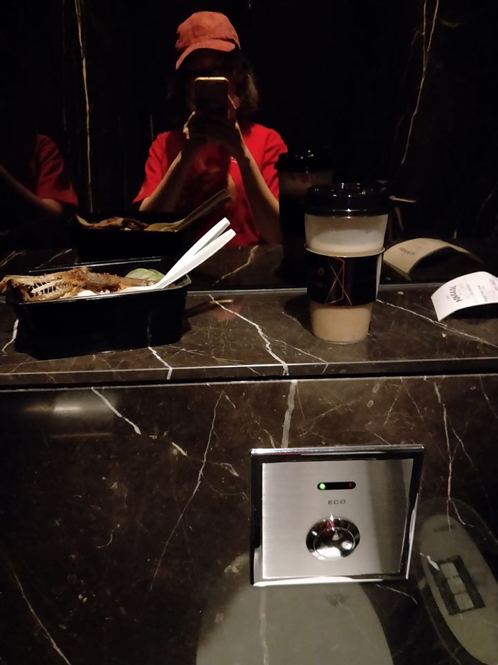 F&B worker having her meal in a toilet cubicle