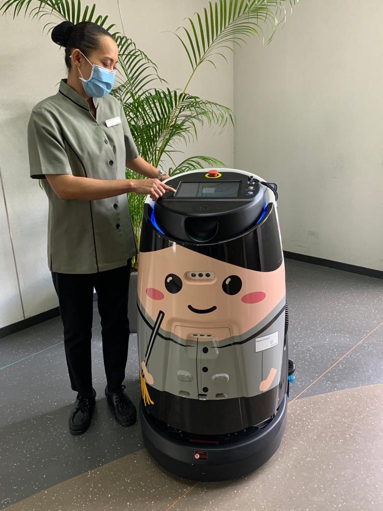 S'pore man greeted by huge cleaning robot on 1st day back to work at