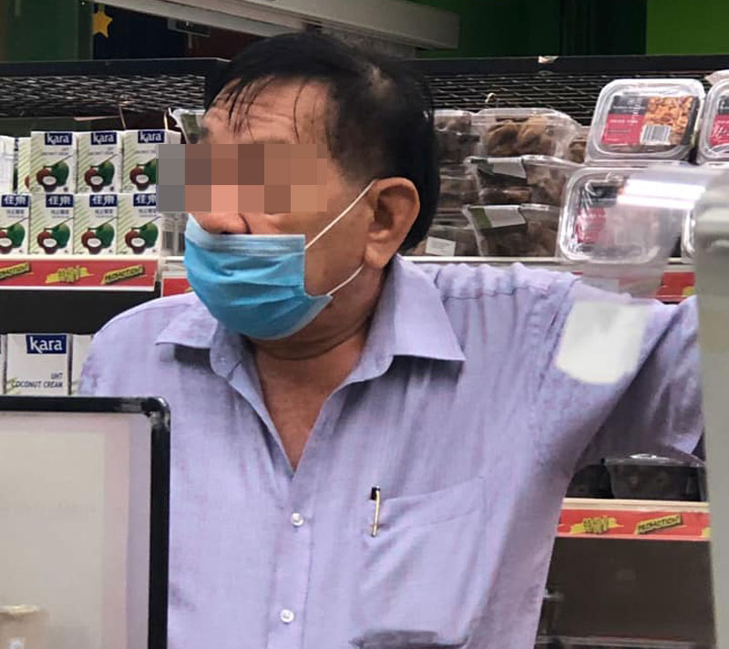 Man uses straw to shoot bubble tea pearls at signboard near Woodlands ...