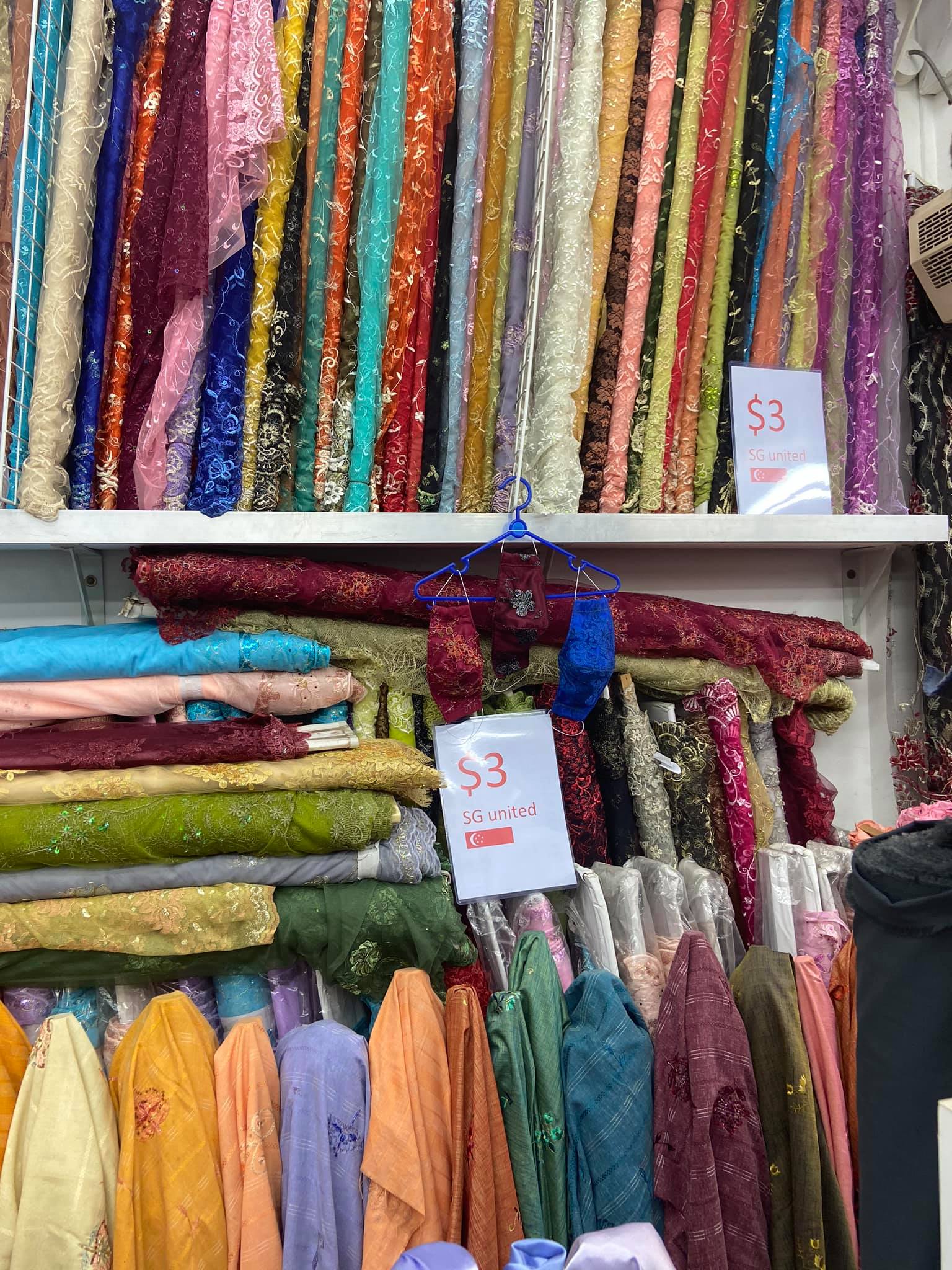 Chinatown textile shop selling lace & satin fabrics at only S3/metre