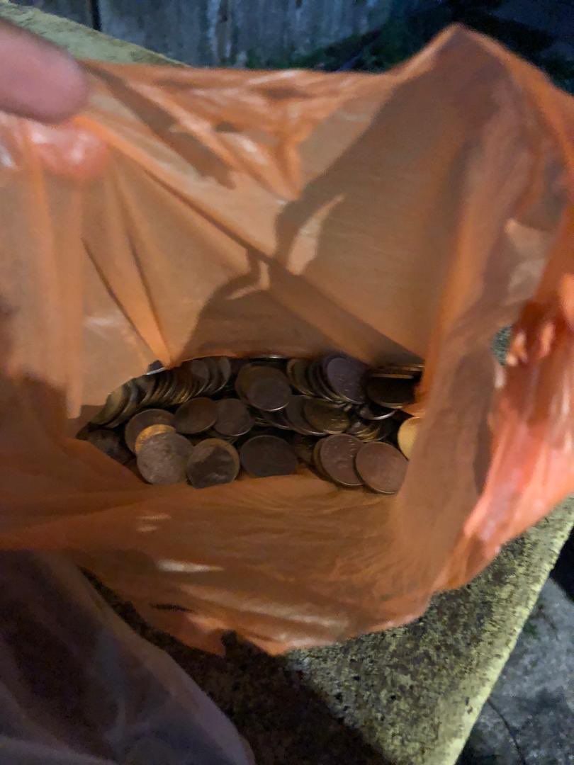 A bag of coins for a slice of pizza.