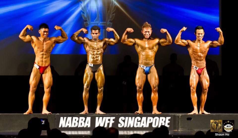 Image of Murugesan at a bodybuilding competition in Singapore