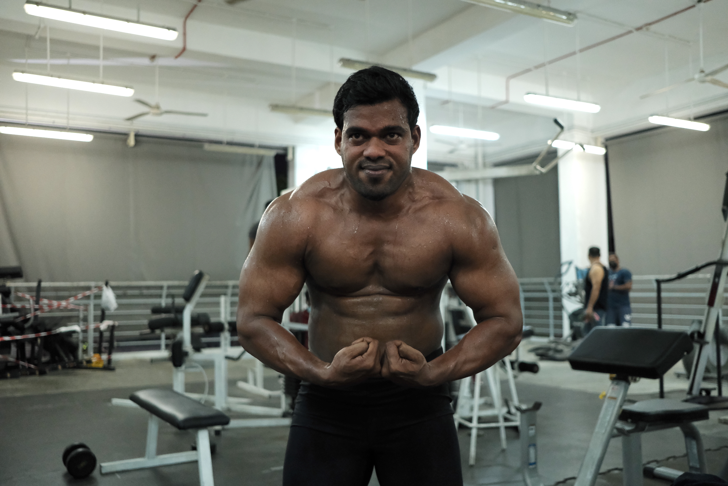 Image of Murugesan as he works out