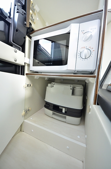 Image of the Prius Camper's interior, showing the microwave