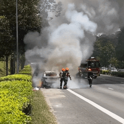 GIF of SCDF fighting the burnt car