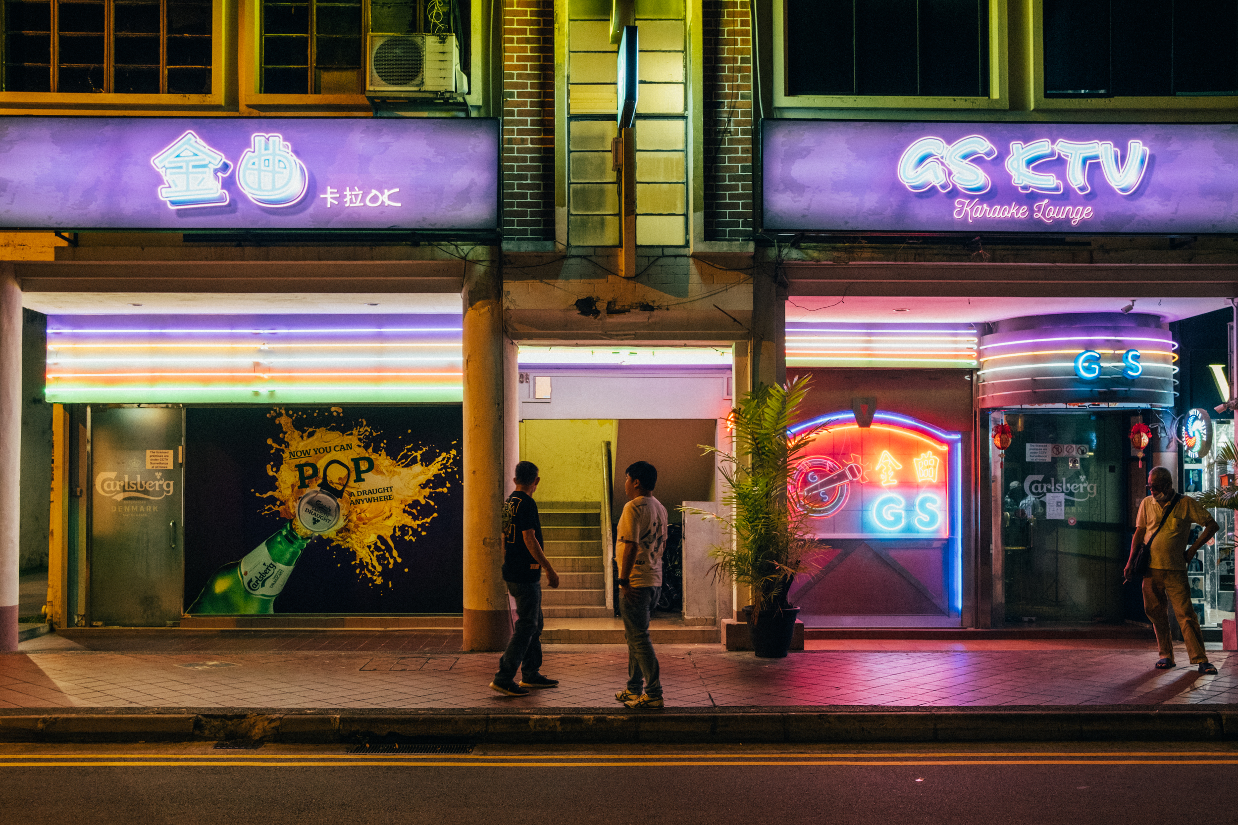 Image of people standing in front of bar in Joo Chiat