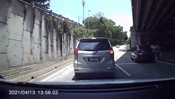 Gif of the woman trying to stop the car thief.
