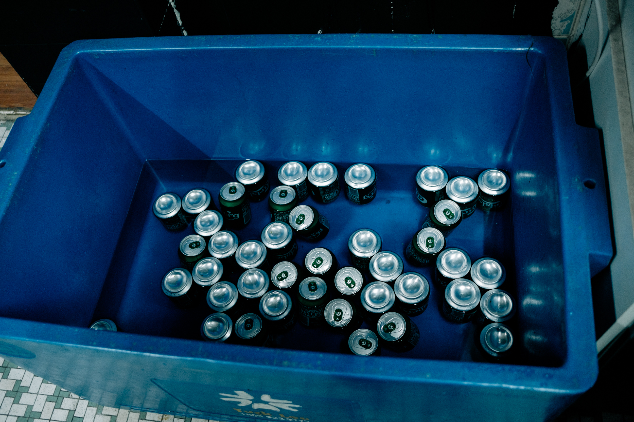 Image of cans of beer in a cooler