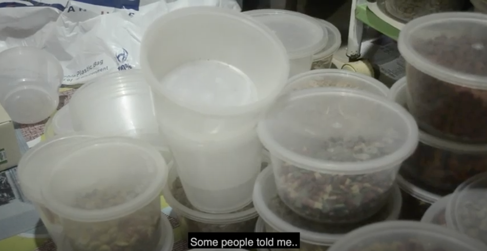 image of the man's cat food in containers