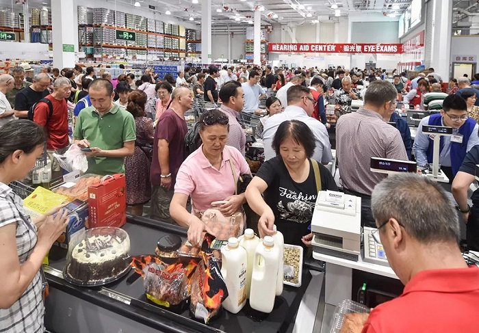 Influencers in Shanghai are posing at Costco, pretending they're