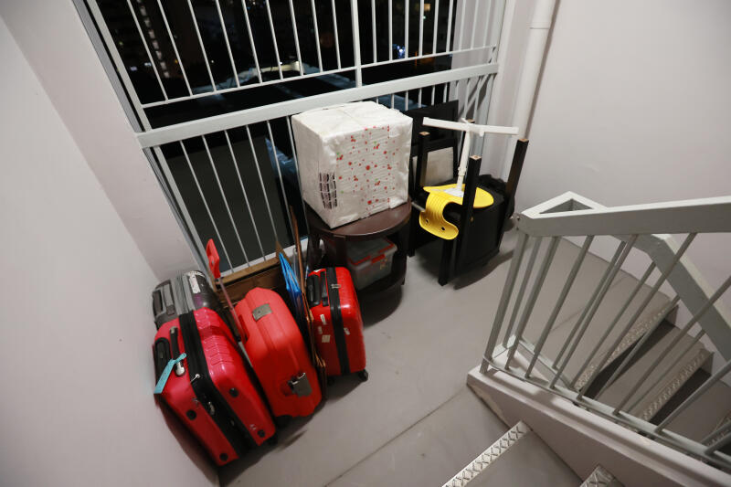 sengkang-hoarder-clutter-suitcases.jpg