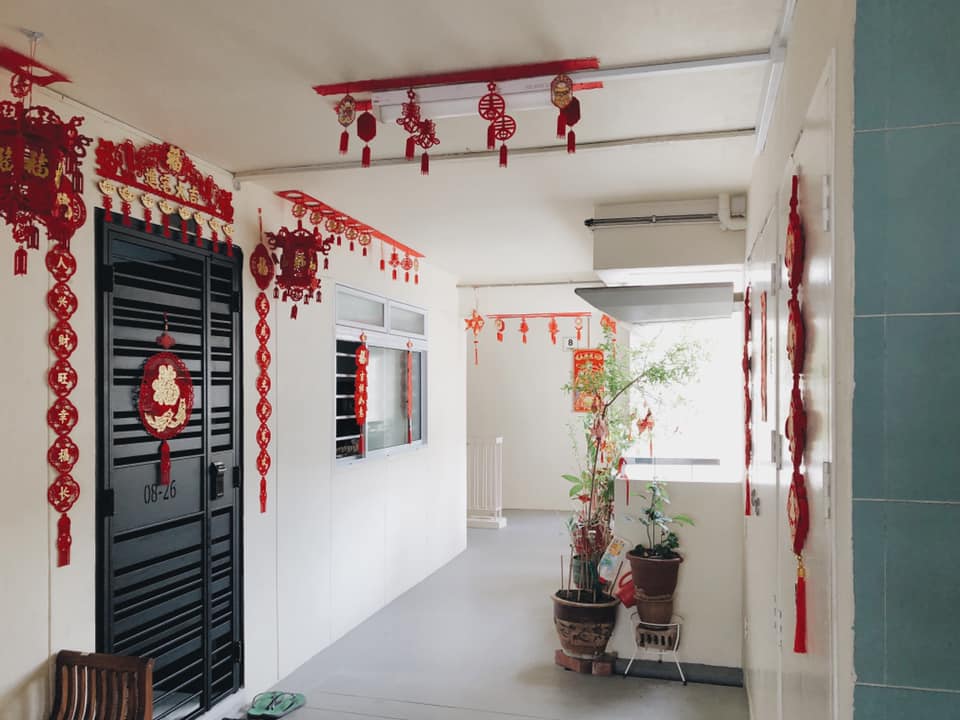 Woodlands residents spruce up HDB corridor with fortune god doll ...
