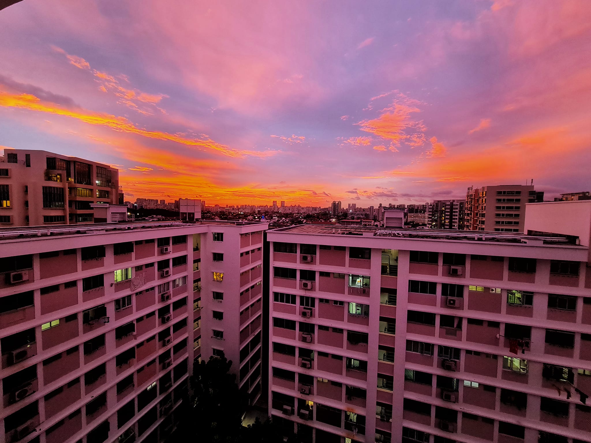 The pink sunset in Singapore yesterday. : r/mildlyinteresting