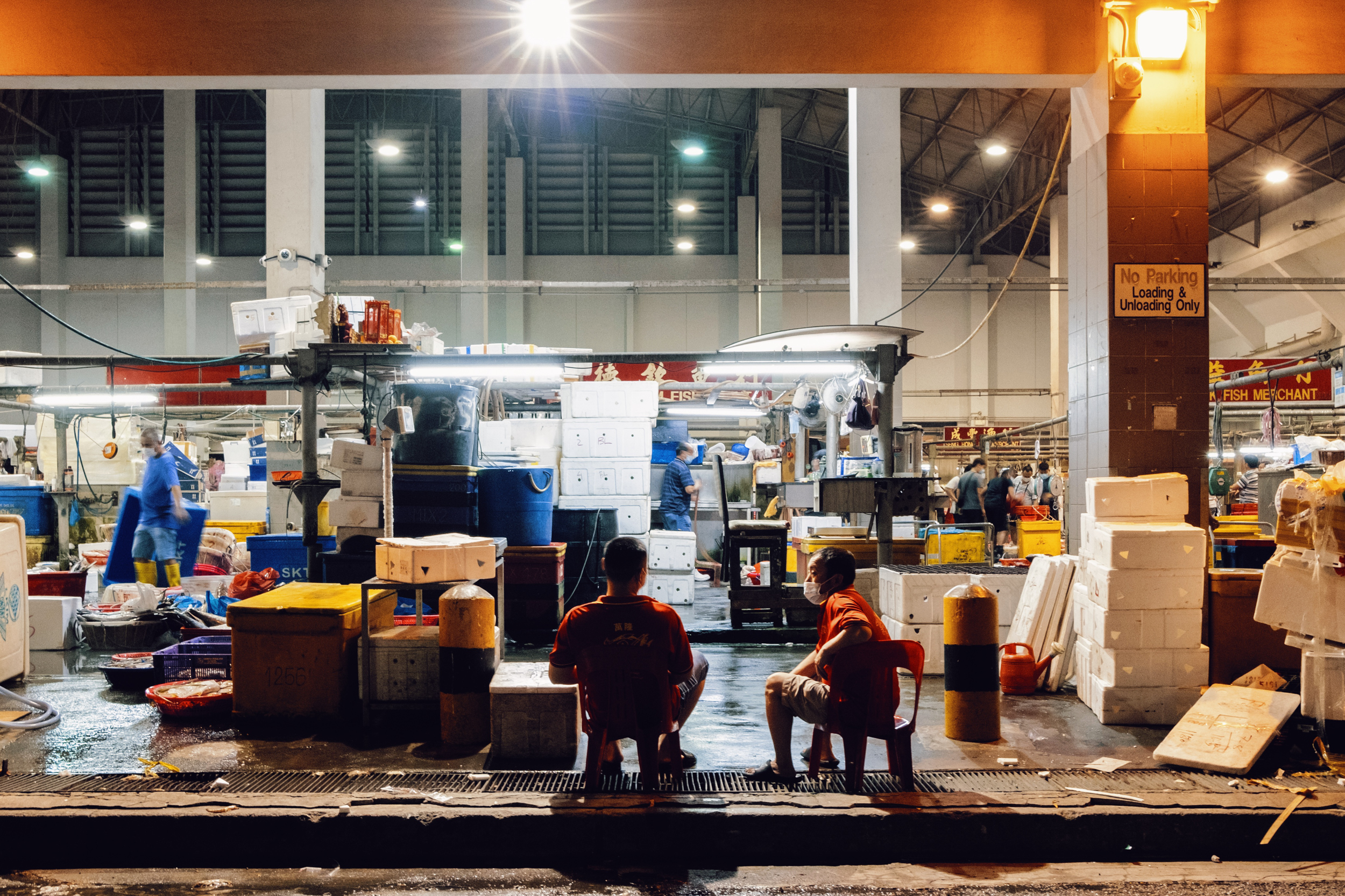 Senoko workers rest after the crowd dies down.