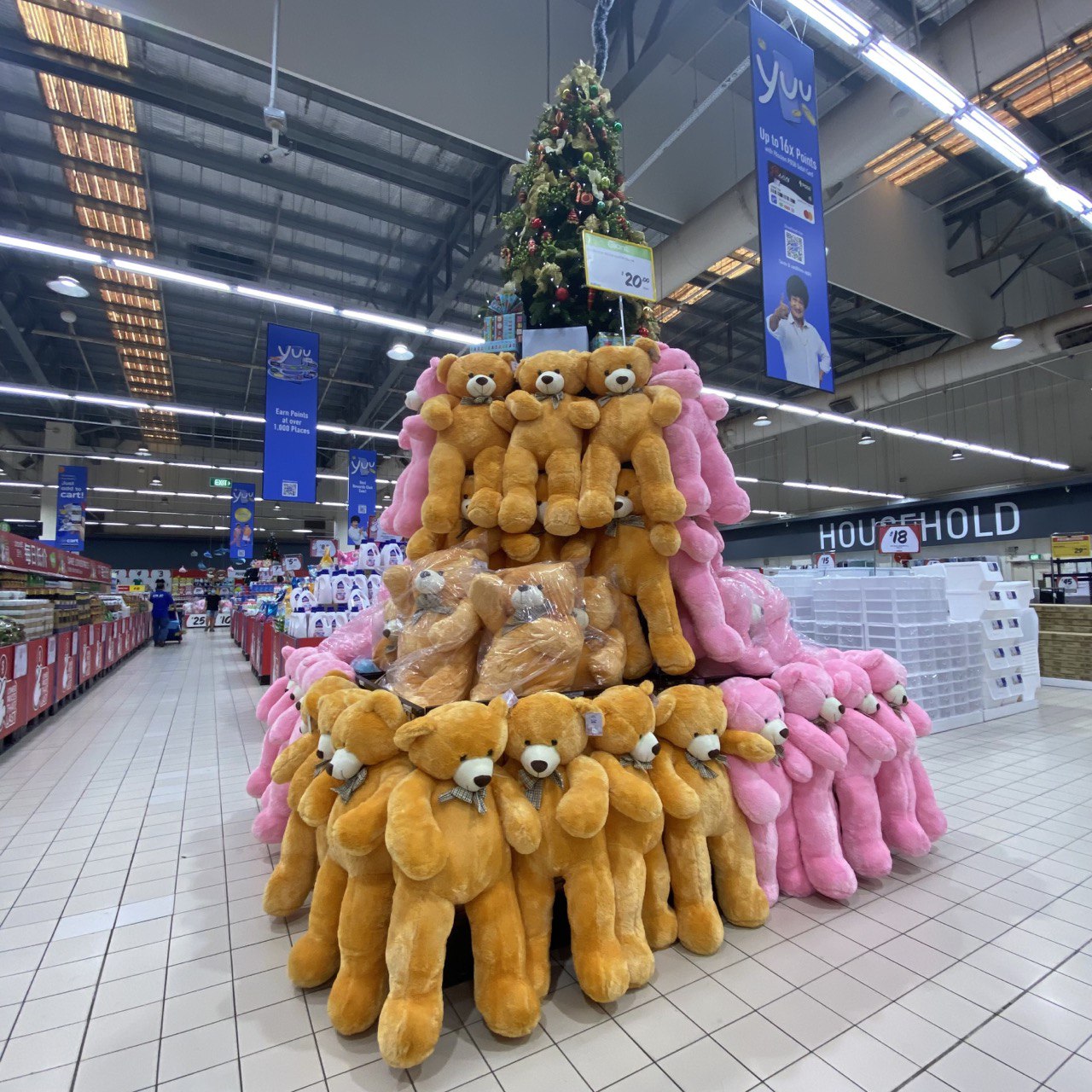 stacked pyramid of giant bear plushies