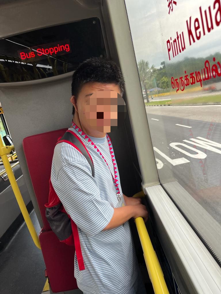 Li Xi on a bus