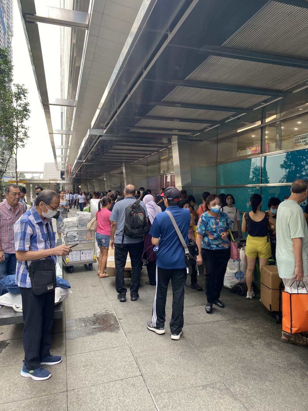 Large crowd at SGX Centre with many lugging donations for Turkey