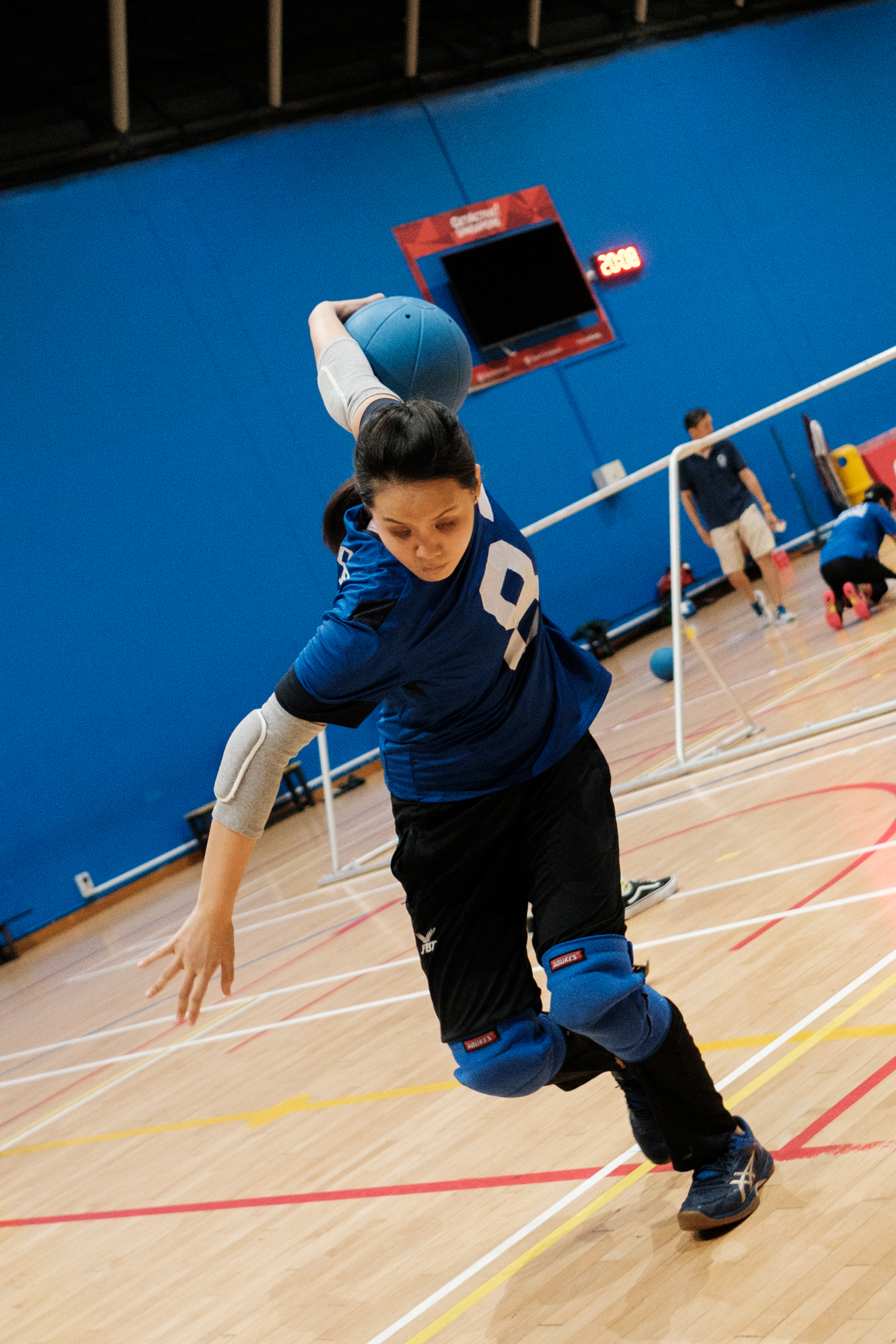 Joan Hung demonstrates a throw in goalball