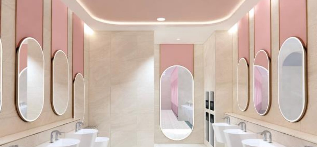 The interior of a public toilet, with bright pastel colours.