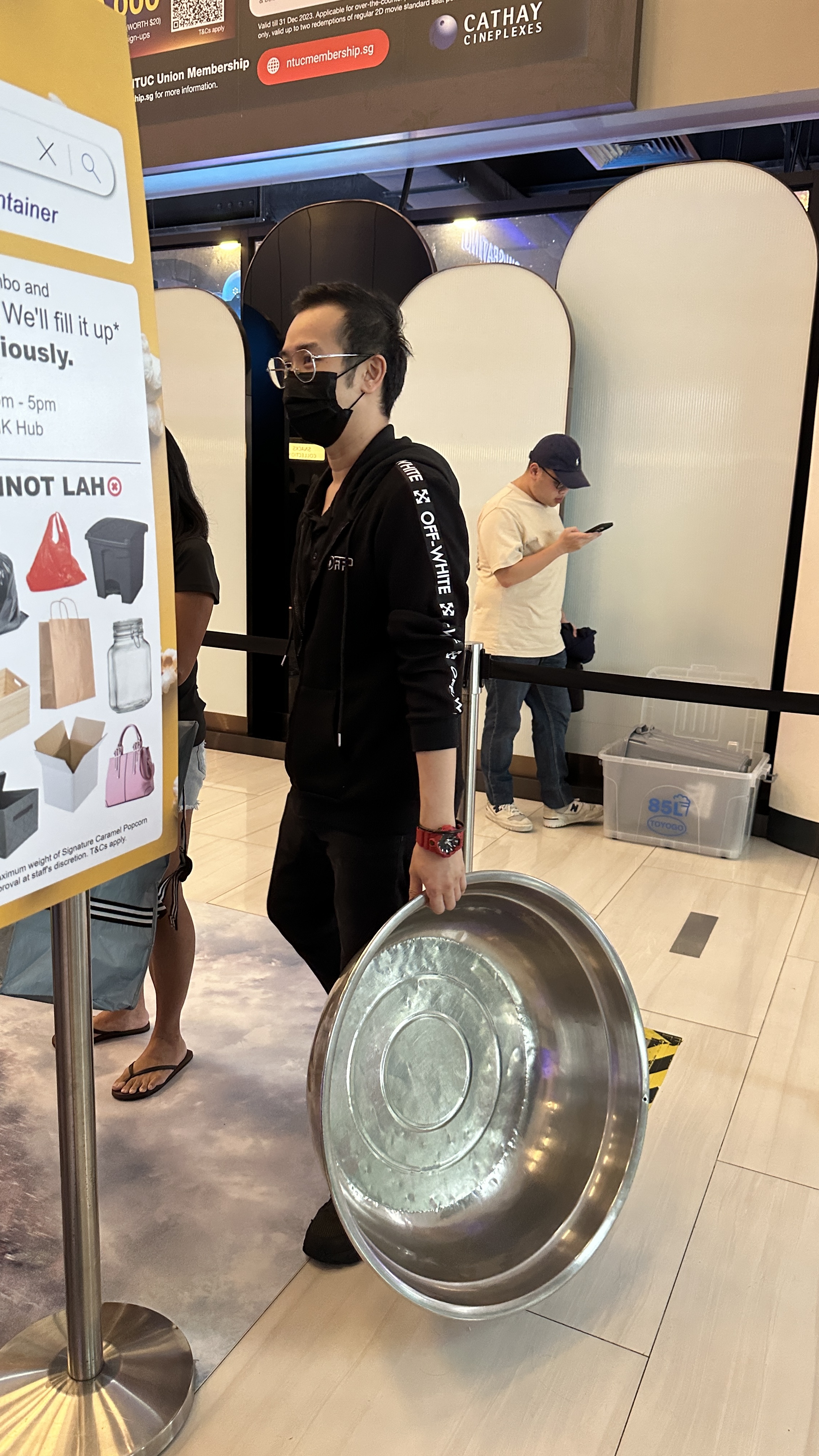 Guy with metal basin