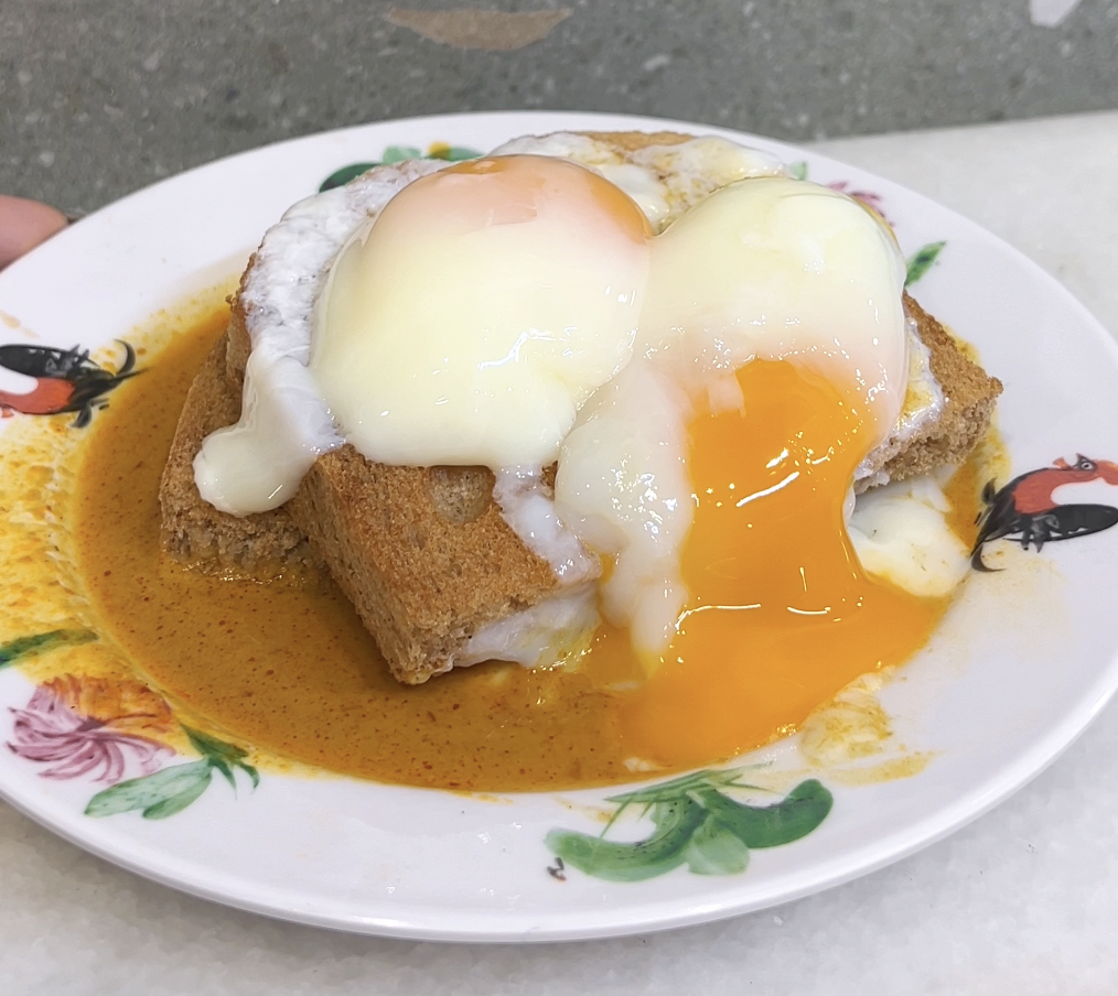 CHOMP! Curry Toast Benedict With Crispy Dahfa Codfish