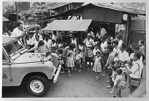 Prime Minister Lee Kuan Yew touring villages to address both Malays and Chinese to appeal for calm amidst communal tensions during the 1964 racial riots