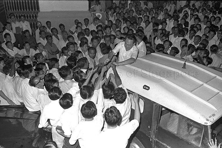 Prime Minister Lee Kuan Yew being congratulated by supporters after his election victory at the Legislative Assembly General Elections. 