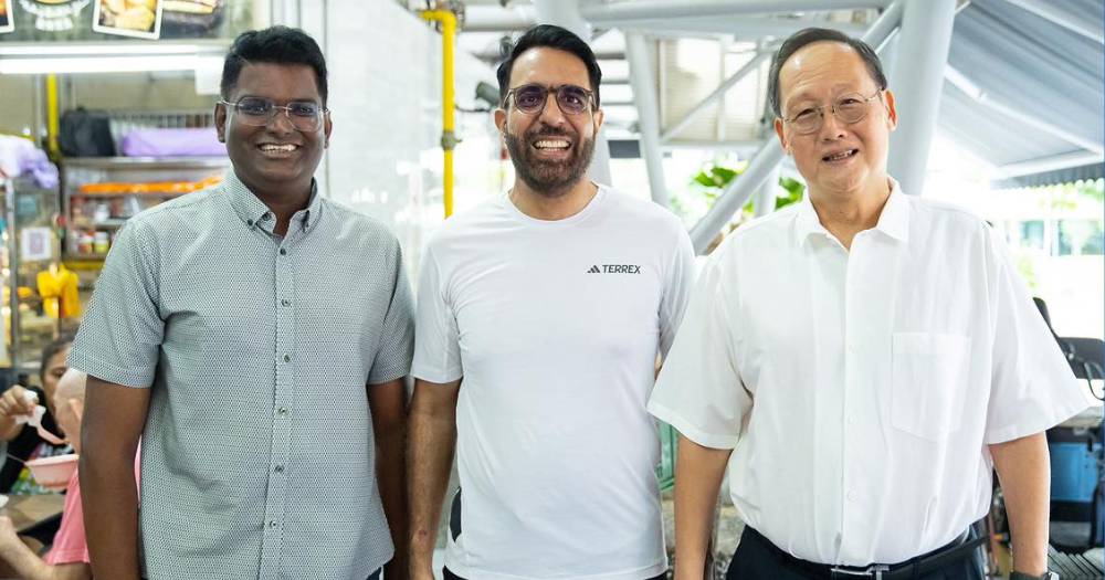 Tan See Leng greeted by Pritam Singh during walkabout at Bedok Reservoir hawker centre